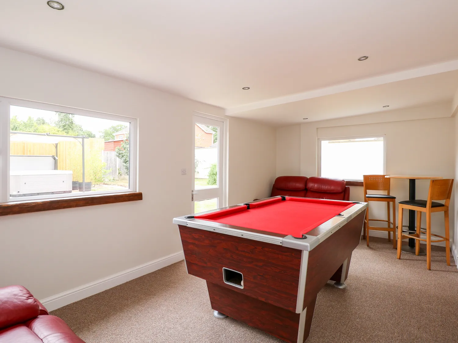 The games room with pool table at Daisy Tree Cottage