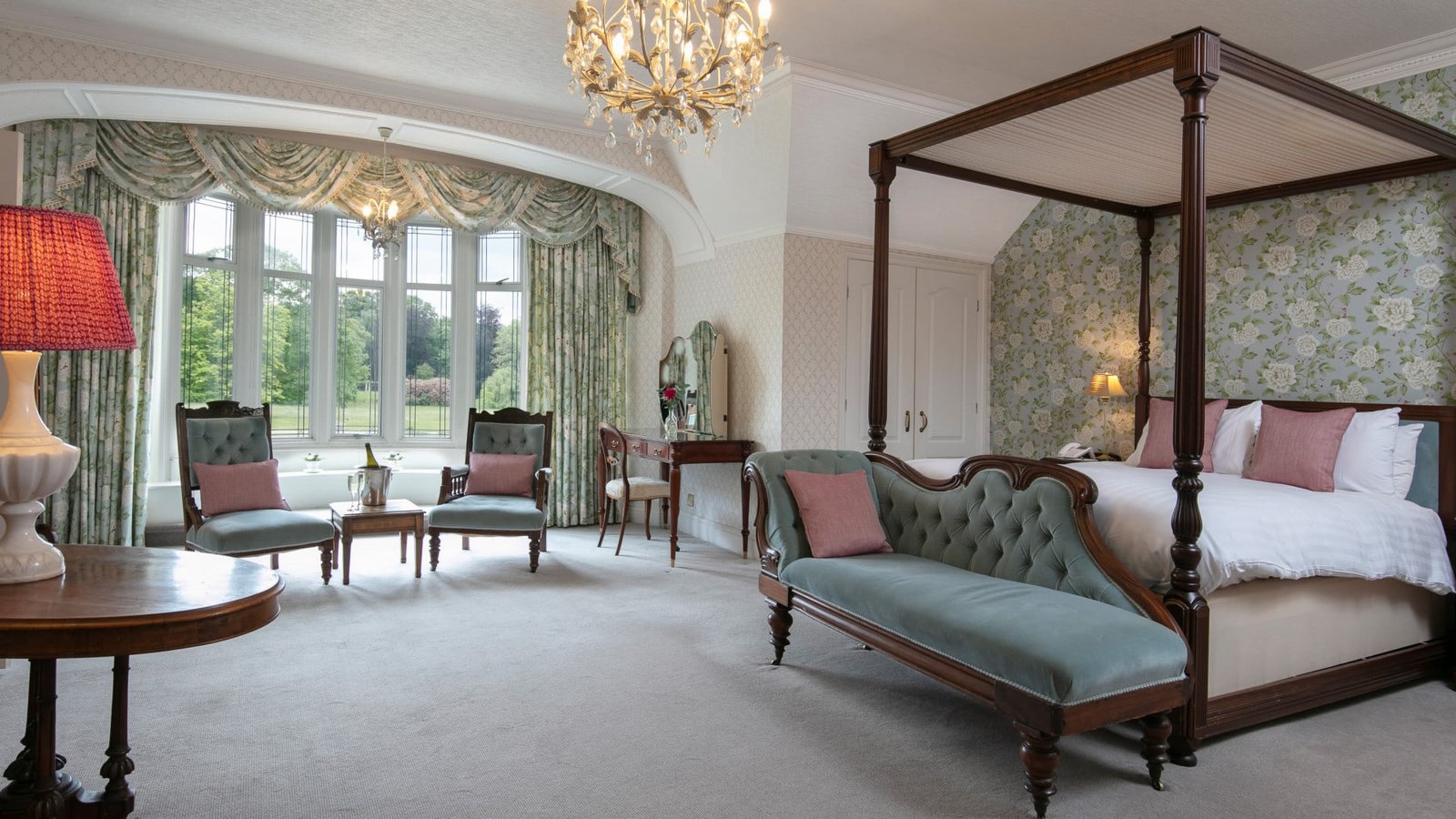 A four-poster guest bedroom at Petwood Hotel