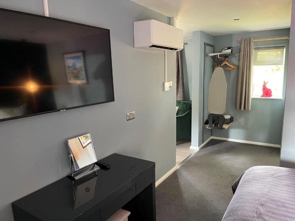 In-room television and air conditioning at Village Limits
