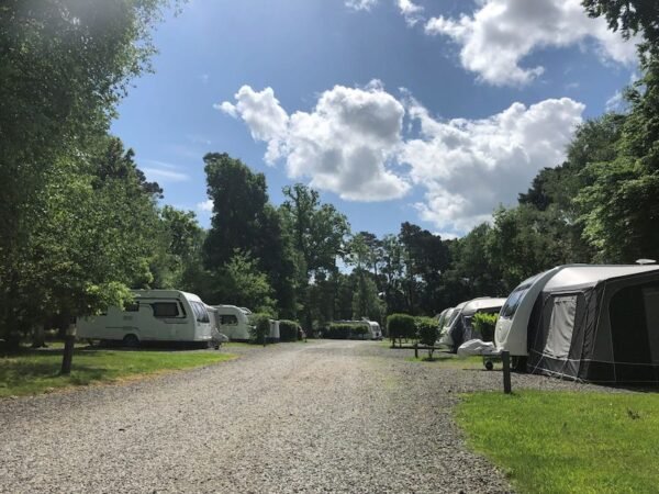 Touring caravans at Woodhall Country Park