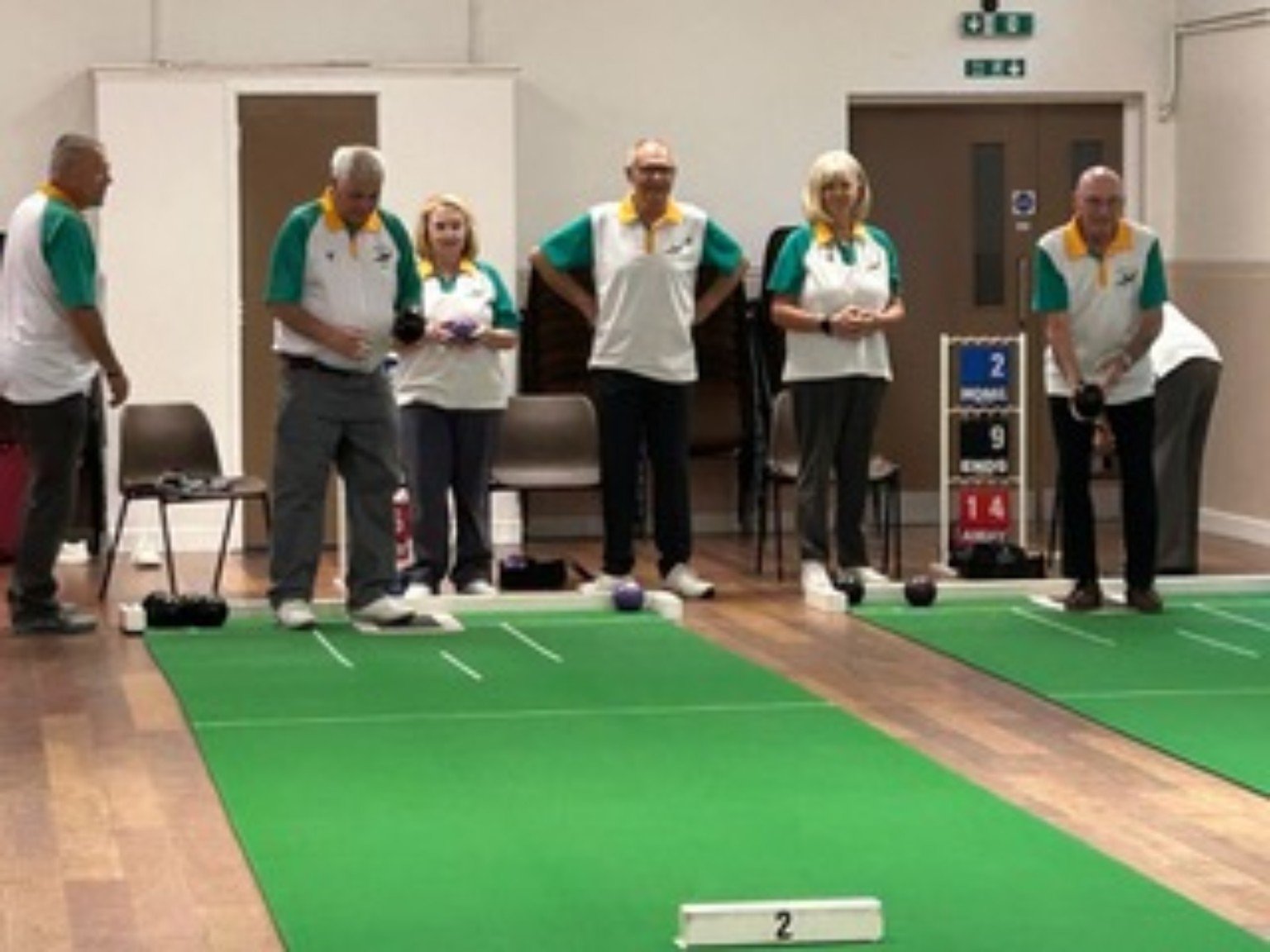 Woodhall Spa Short Mat Bowls Club members playing on two mats at Coronation Hall