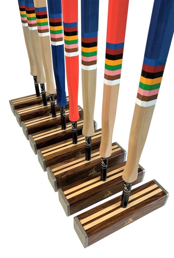 Wooden croquet mallets with colourful handles; representative equipment photograph