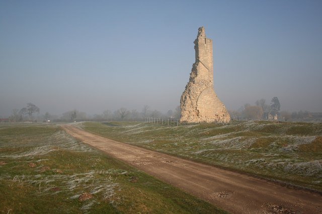 Ruins of Kirkstead Abbey beside a track on a frosty morning