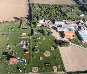 Aerial view of the play areas, buildings and paddocks at Rand Farm Park