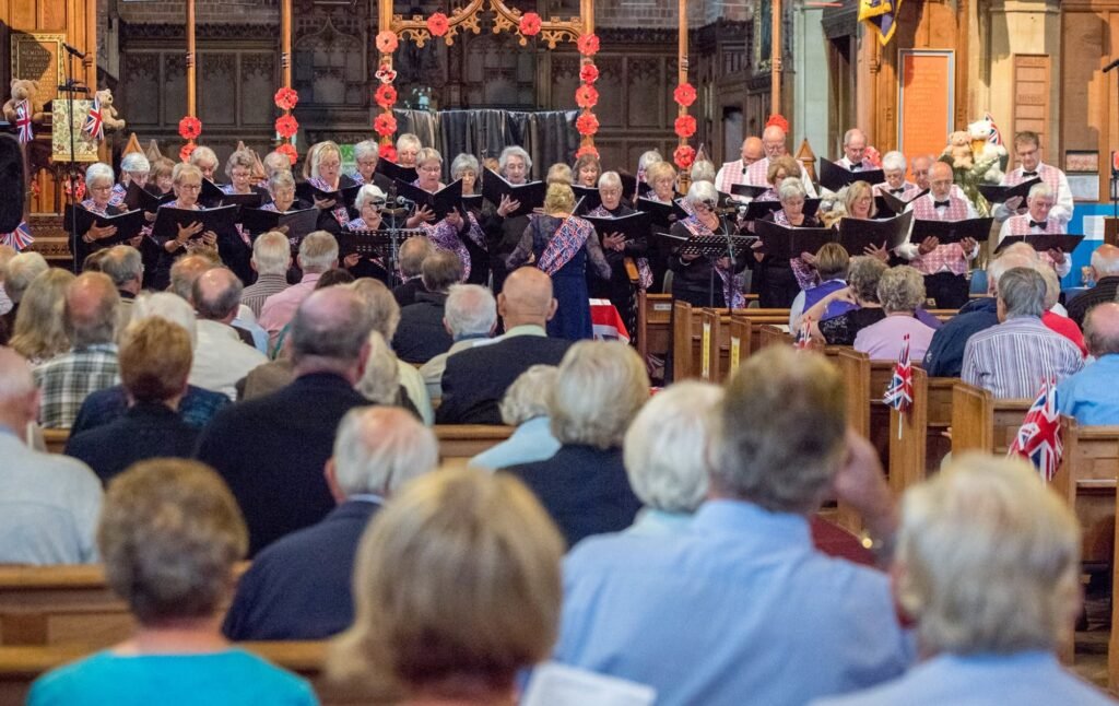 The Spa Singers performing for an audience in a Woodhall Spa church