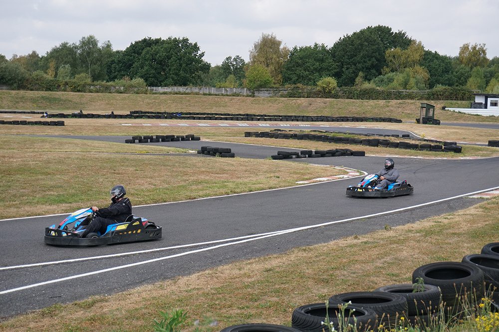Drivers racing on the outdoor circuit at Tattershall Kart Centre